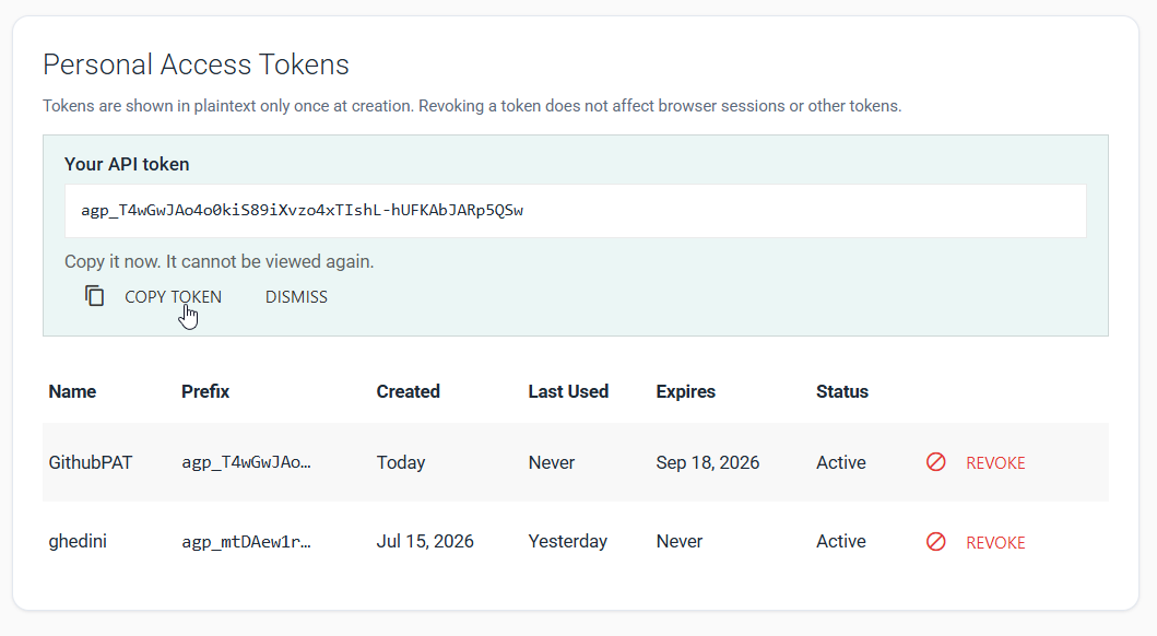 New personal access token displayed with Copy Token and Dismiss actions